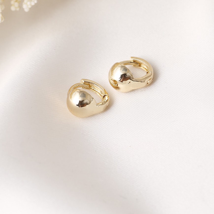 Aretes huggies 2015